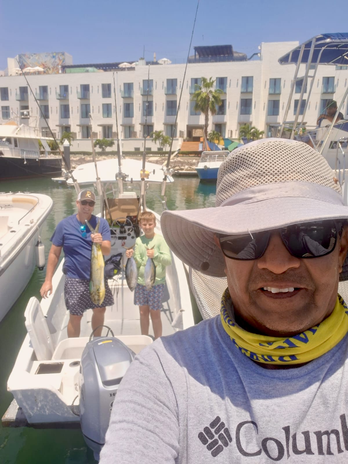 Captain Hollywood with father & son: mahi and tuna aboard