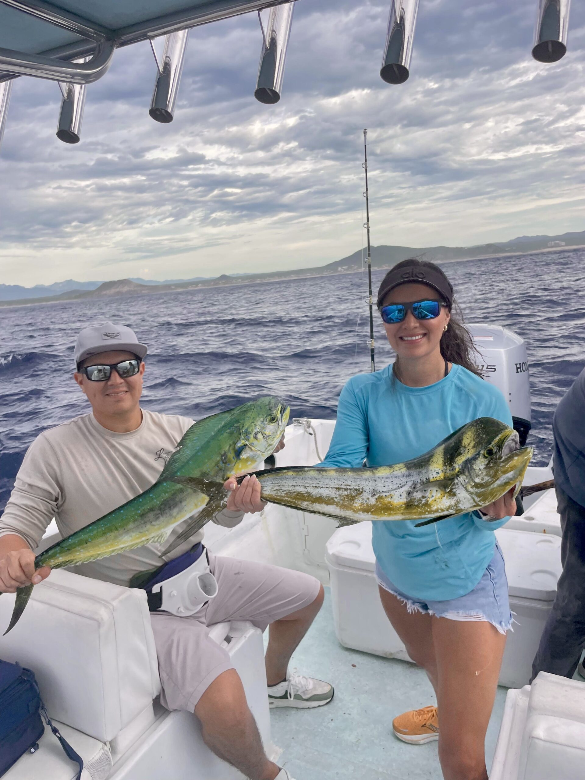Couple with Mahi Mahi aboard Daliken panga
