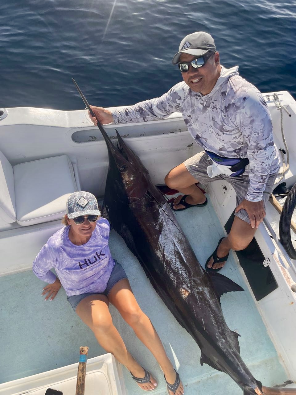 Couple with ~200 lb Blue Marlin aboard Daliken 26ft Super Panga