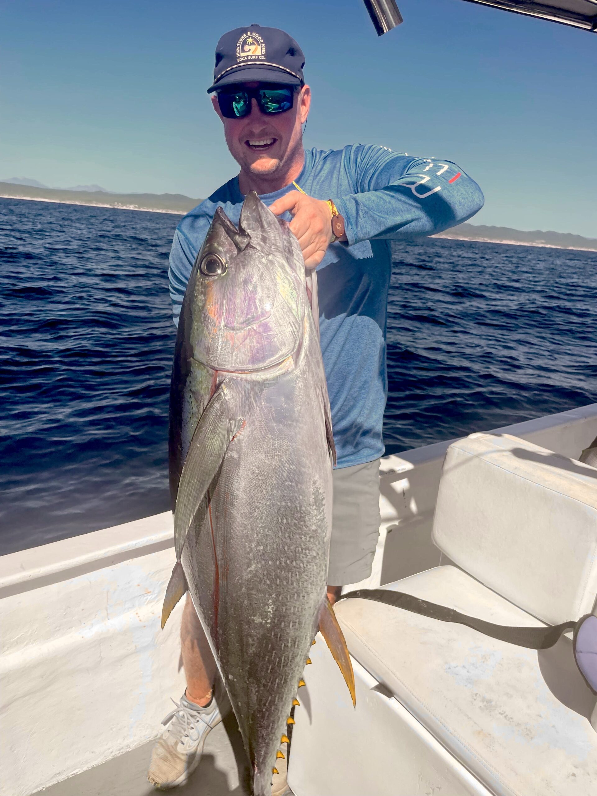 Client with wahoo about 25 lb aboard near Iman Bank — Daliken Sportfishing