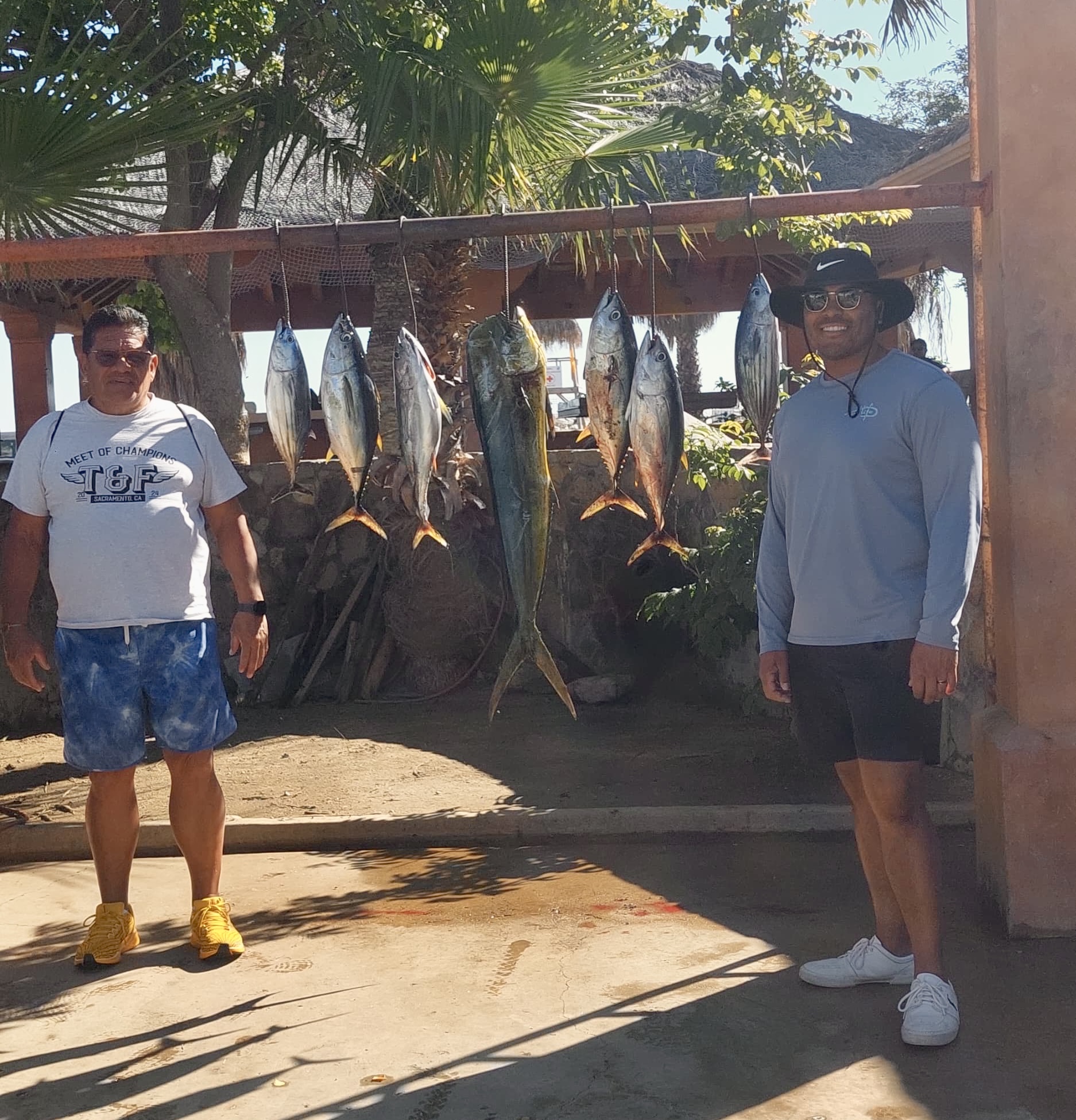Clients posing with tuna caught near La Fortuna Los Cabos
