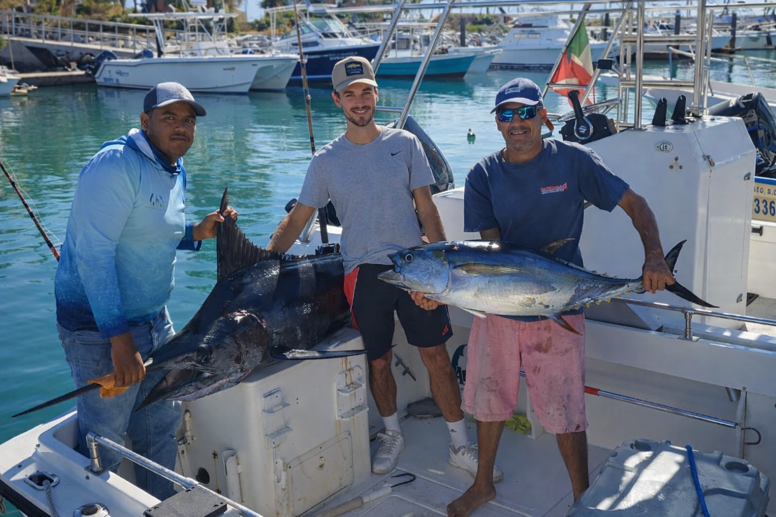 Daliken Sportfishing offshore crew celebrating a black marlin capture near San José del Cabo, Mexico