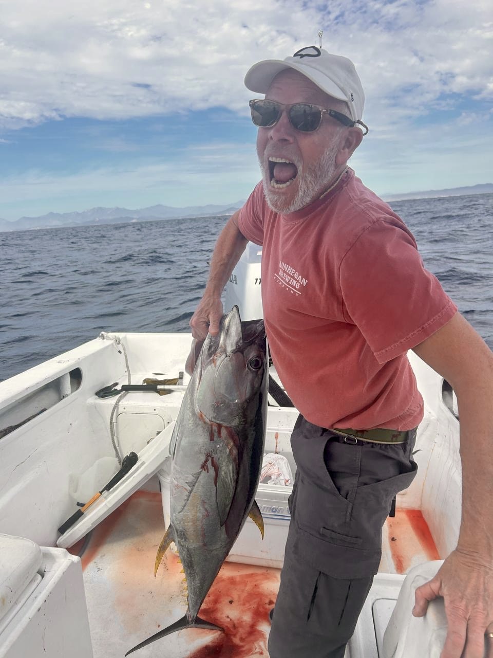 Angler with yellowfin tuna catch on a private fishing charter departing San José del Cabo
