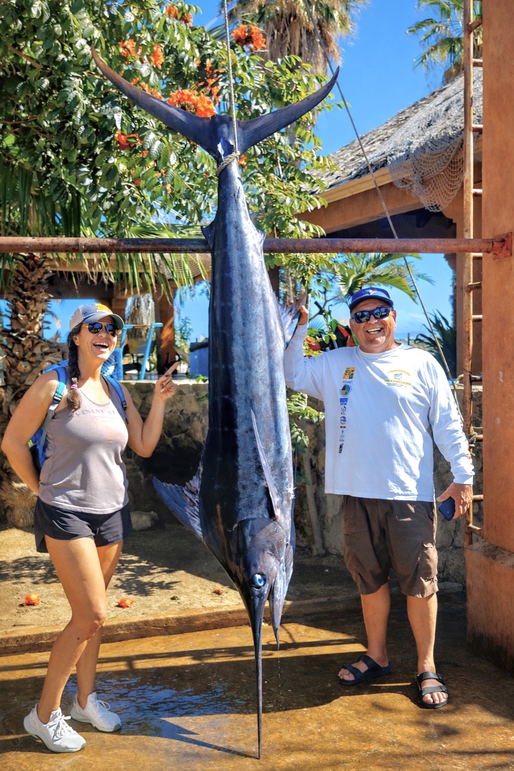 Client posing with a striped marlin caught in season near San José del Cabo with Daliken Sportfishing