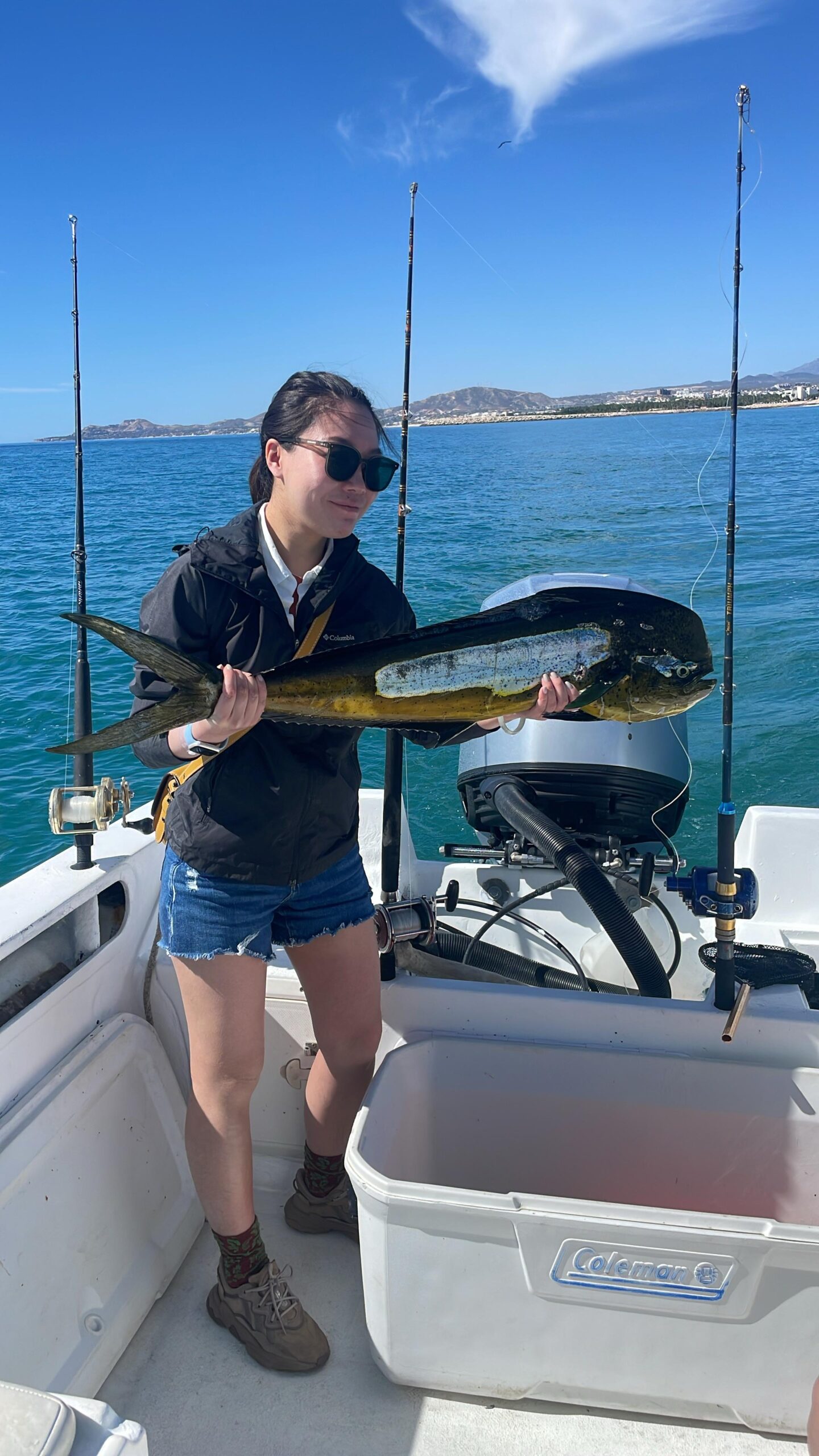 Happy anglers with a large dorado mahi-mahi caught offshore near San José del Cabo